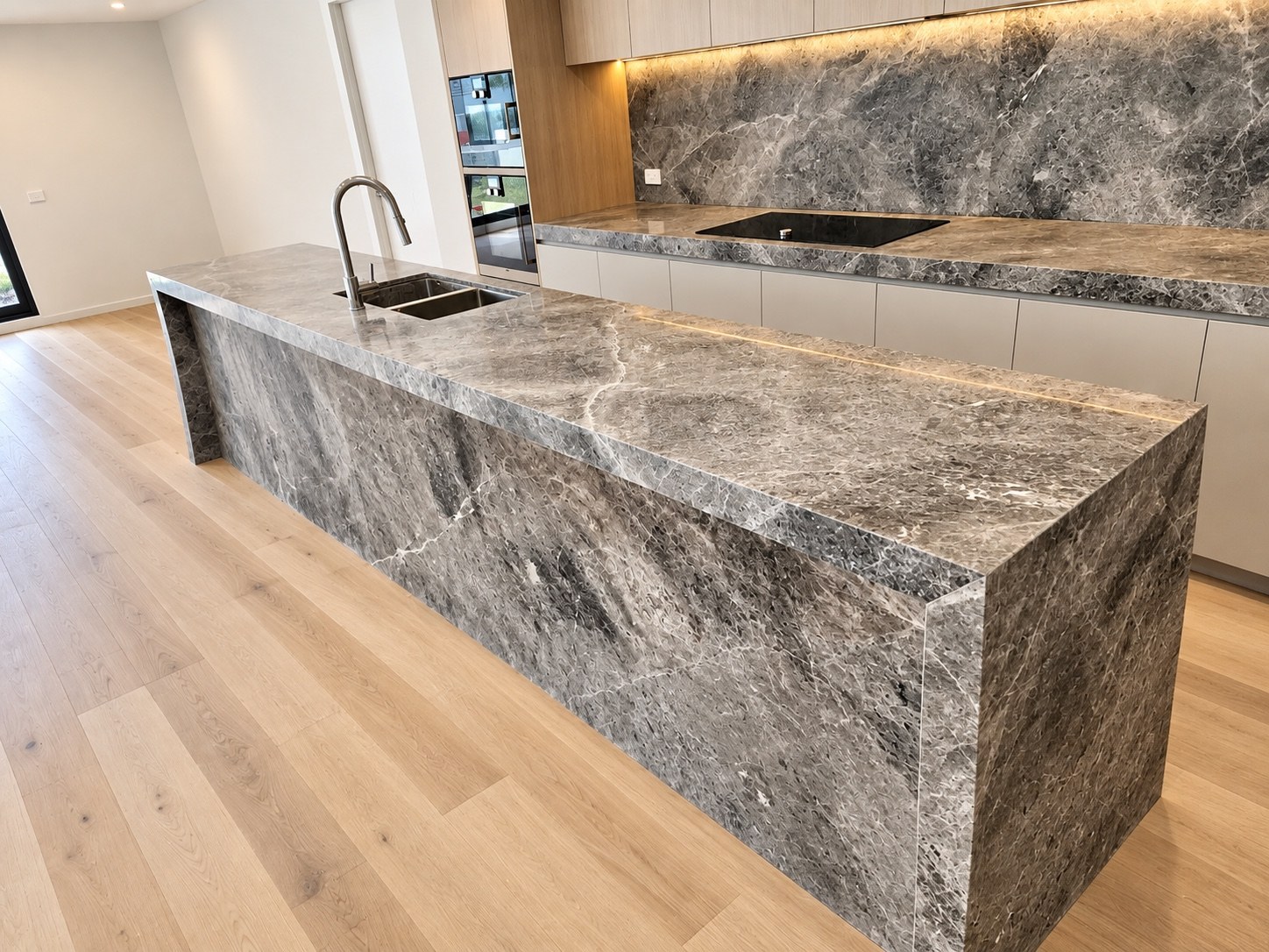 Grey stone kitchen island